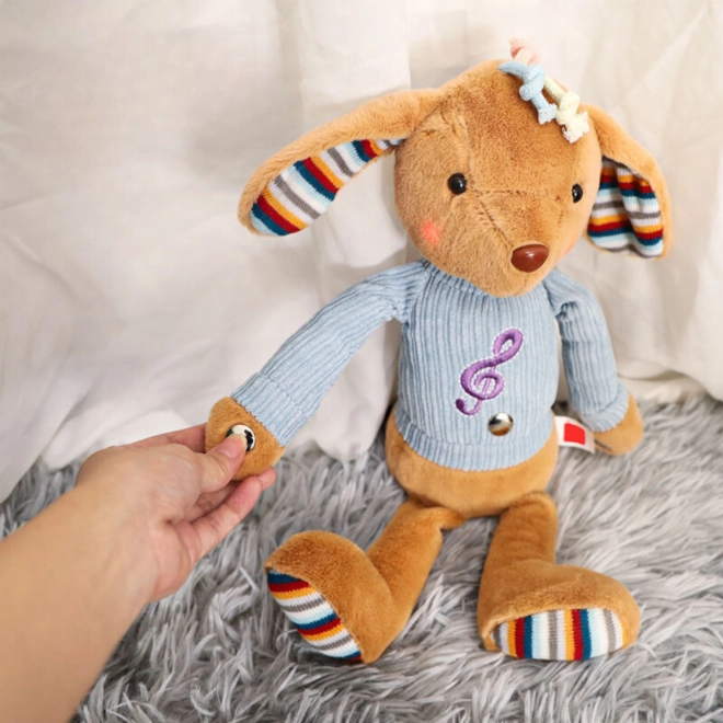 Chien en peluche interactif avec mélodie et lumière