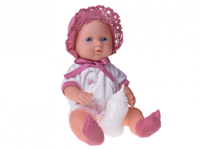 Poupée bébé avec porte-bébé