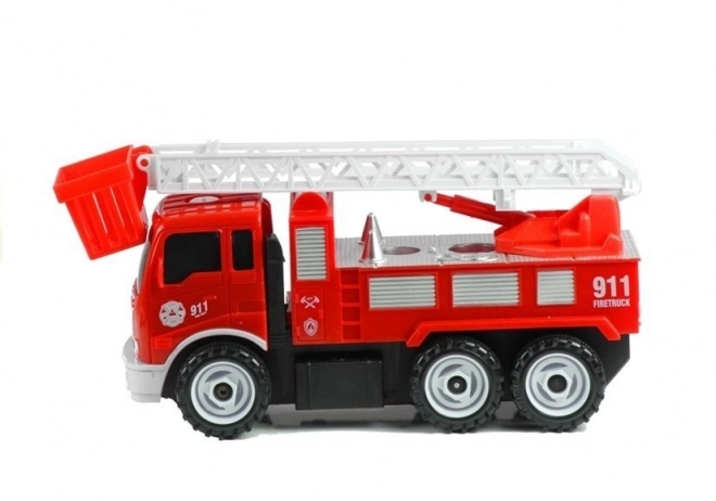 Camion de pompiers avec échelle et outils