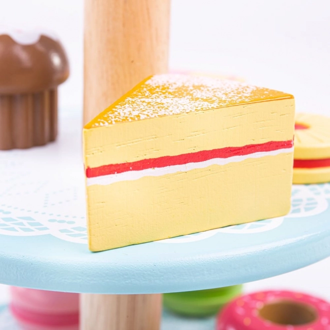Support en bois avec gâteaux jouets