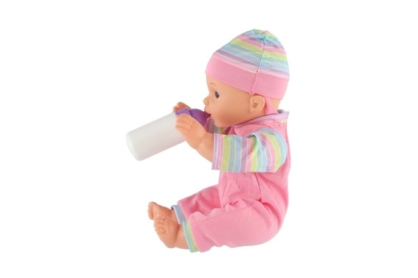 Poupée bébé 30cm en plastique dans un porte-bébé/siege auto avec biberon en blister
