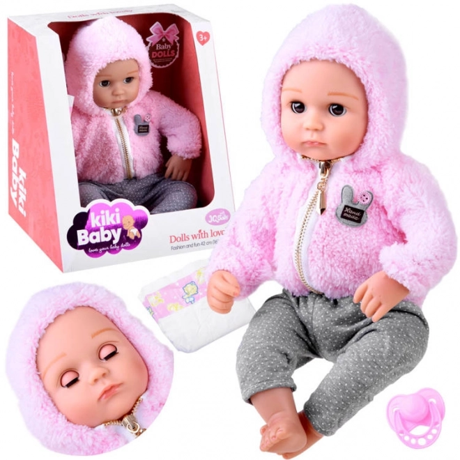 Poupée bébé en caoutchouc souple 43 cm
