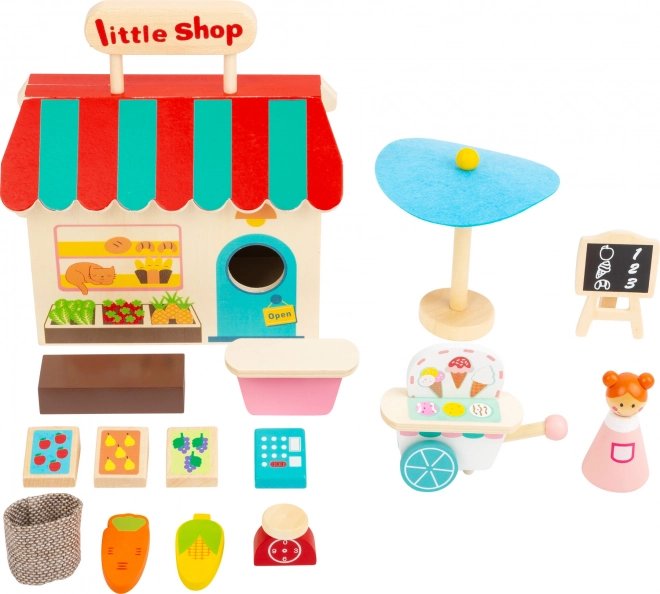 Boutique en bois dans une valise de Small Foot