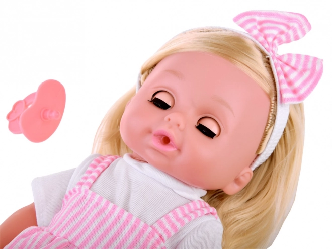 Poupée bébé avec de longs cheveux, parle et pleure