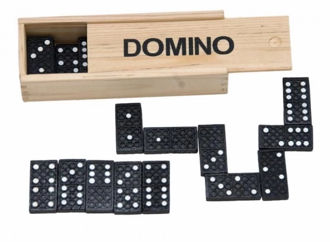 Dominos classiques dans une boîte en bois