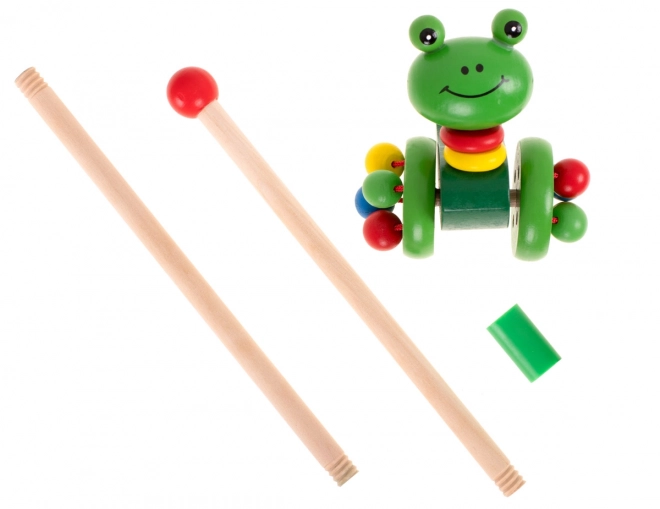 Grenouille en bois sur bâton