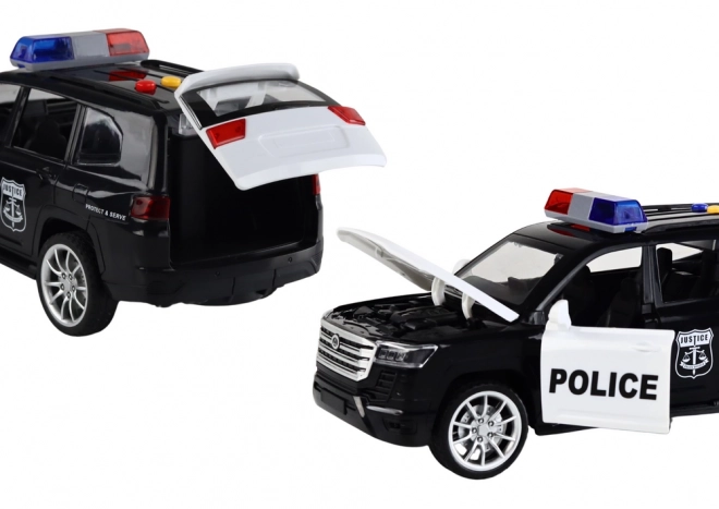 Voiture de police avec effets, portes ouvrantes et échelle 1:14