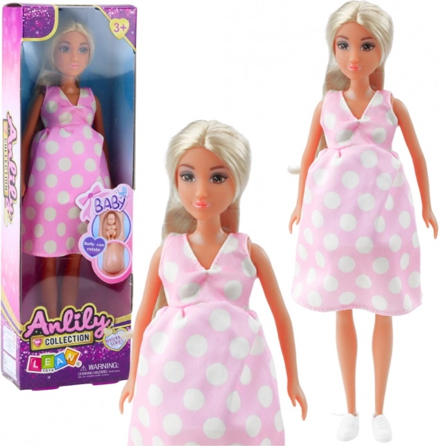 Poupée Anlily Enceinte en Robe Rose à Pois Cheveux Longs