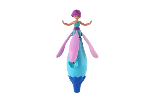Poupée fée à ressort en plastique 17 cm dans une boîte 8x24x6cm