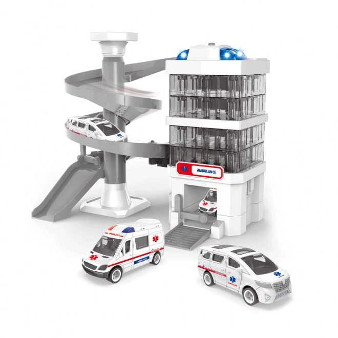 Bâtiment d'hôpital avec voitures et garage avec lumière et son