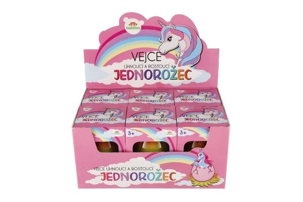Œuf éclos et grandissant licorne plastique 7x10cm dans une boîte 9,5x13cm