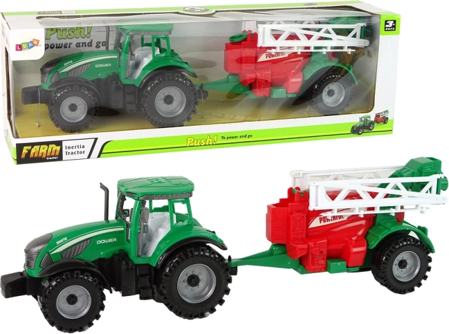 tracteur vert avec pulvérisateur rouge‑vert à entraînement par friction