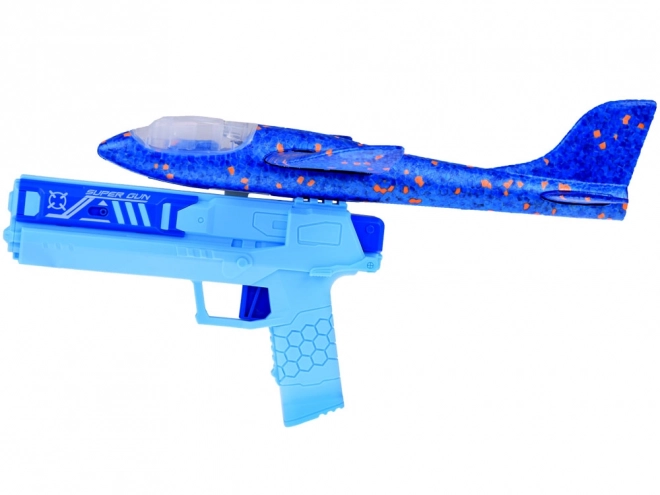 Avion en mousse amusant avec lumières LED lancé depuis un pistolet