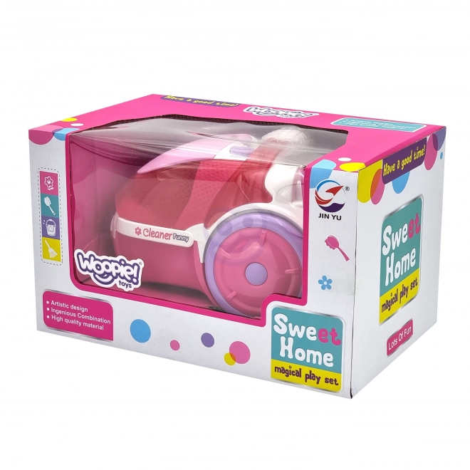 Aspirateur rose pour enfants avec fonction d'aspiration
