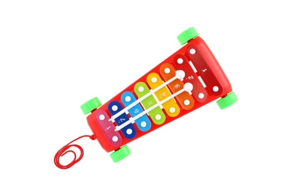 Xylophone plastique/métal 24cm avec baguettes 2 couleurs en sachet 19x31x6cm