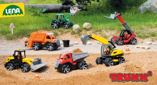 Auto Truxx 2 pompiers pulvérisant de l'eau en plastique 29cm avec figurine