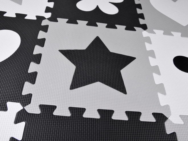 Tapis de puzzle en mousse contrastée avec formes