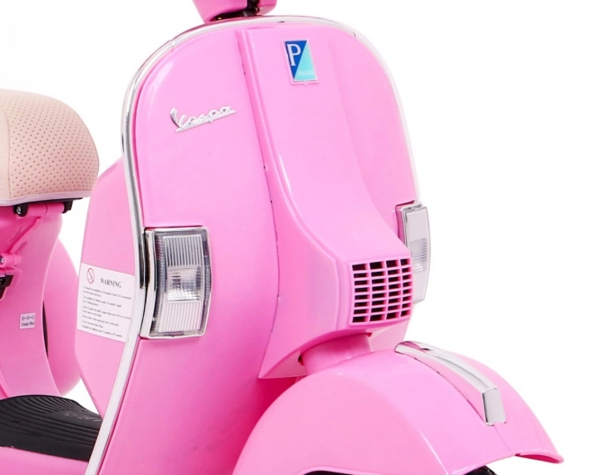 Scooter électrique pour enfants Vespa rose avec roues stabilisatrices