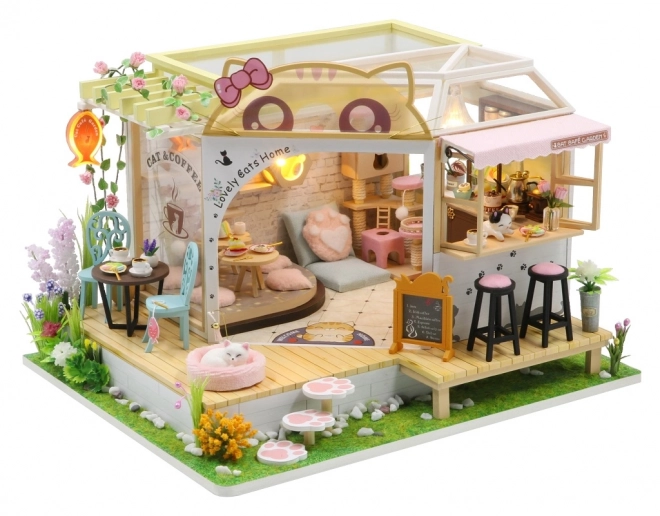 Maquette miniature du café à chats avec jardin