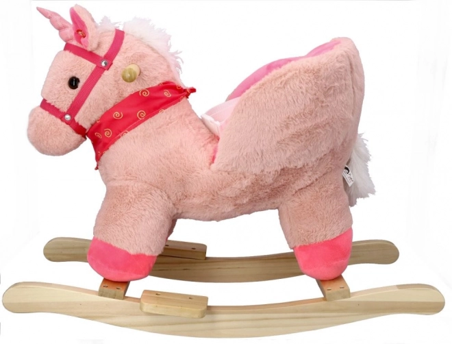 Licorne rose avec siège auto