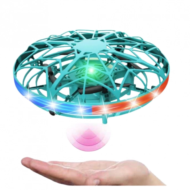 Drone UFO contrôlé à la main avec lumières LED turquoise