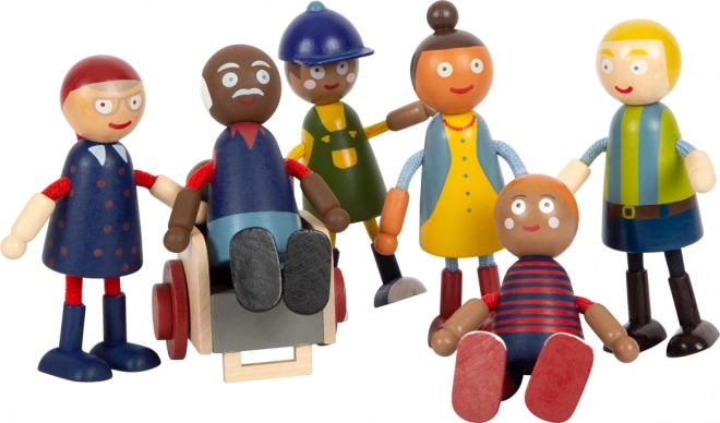 Petites figurines en bois famille avec fauteuil roulant