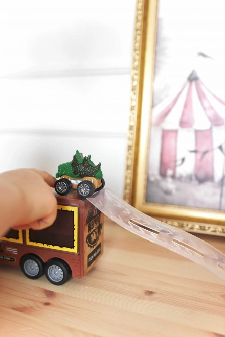 Camion dinosaure avec lanceur et petites voitures