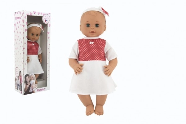Poupée Hamiro à yeux dormeurs 50 cm avec corps rigide et robe blanche à pois rouges
