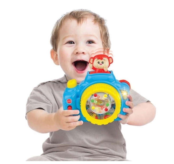 Appareil photo avec petit singe pop-up