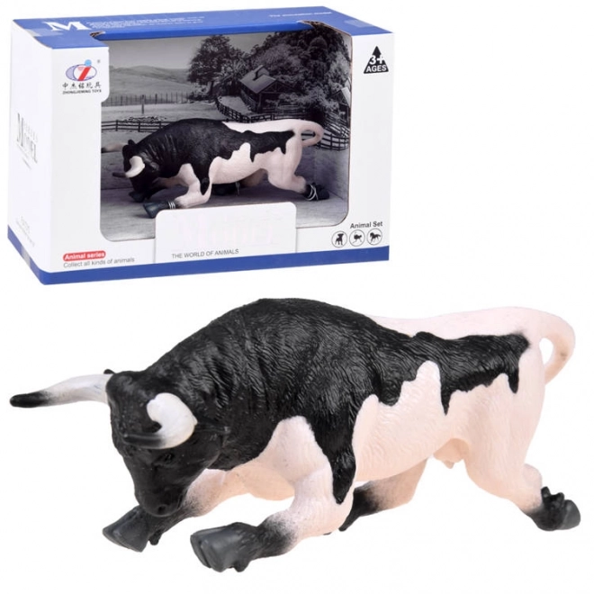 Figurine taureau noir et blanc prêt à attaquer ZA4473