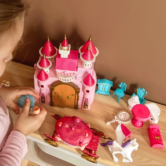 Château magique interactif avec carrosse et accessoires