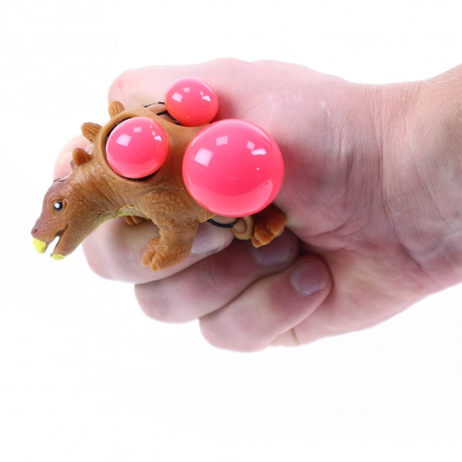 Balle anti-stress de dinosaure avec trous