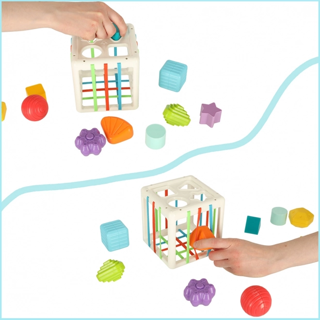 Cube sensoriel flexible avec blocs puzzle carrés et trieur de formes