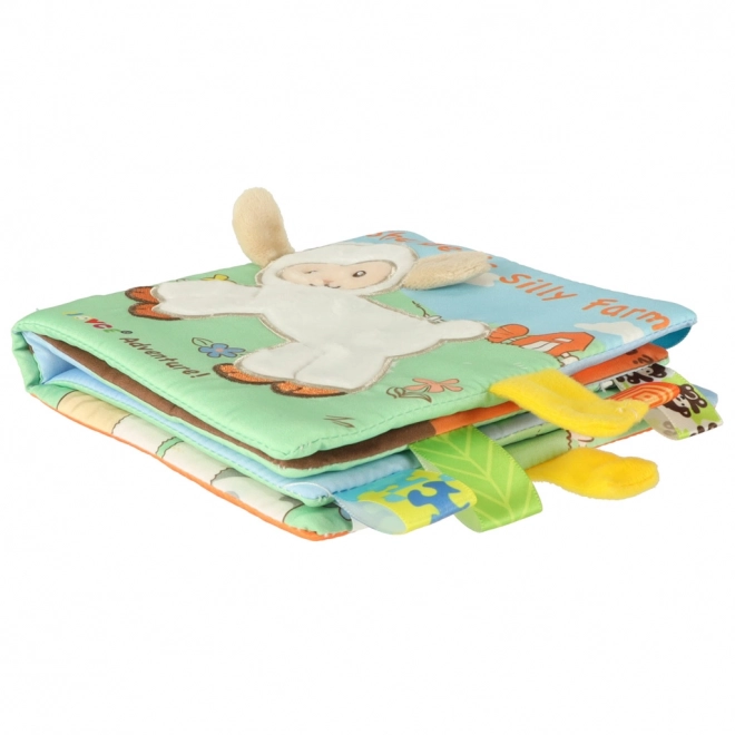 Livre sensoriel pour bébé avec un mouton et des étiquettes