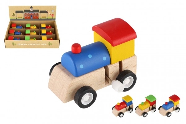 Petit train à clé en bois 7cm ass. 3 couleurs
