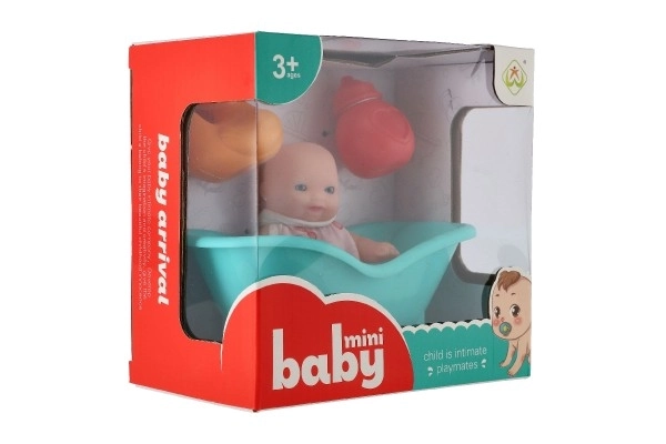 Poupée avec baignoire et accessoires