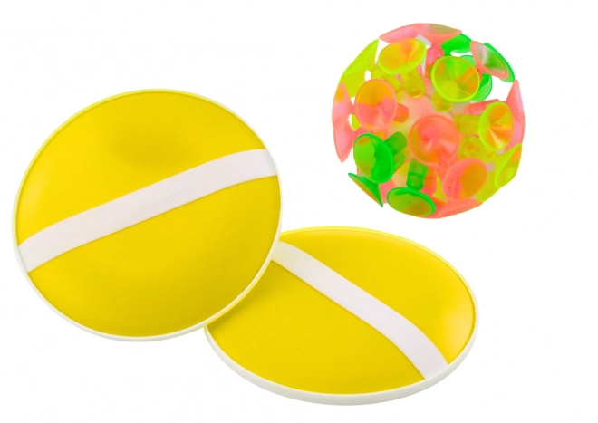 jeu avec battes rondes et balle avec ventouses jaune