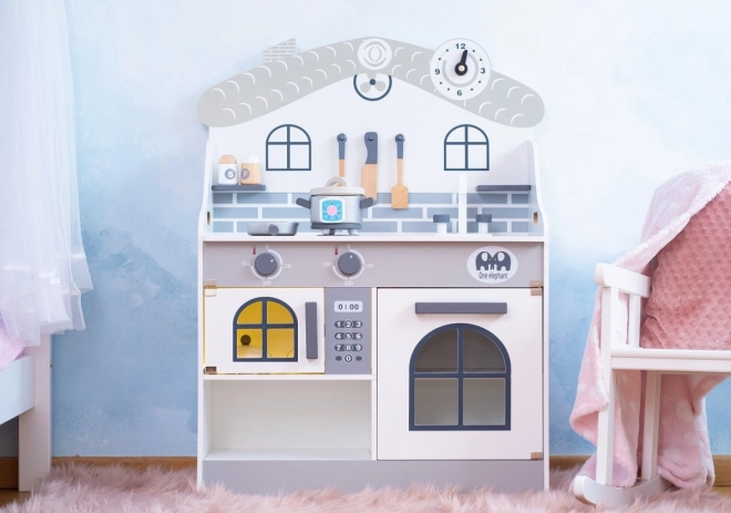 Cuisine en bois avec accessoires Maison