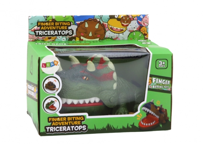 Jeu de compétence dinosaure mordant Triceratops