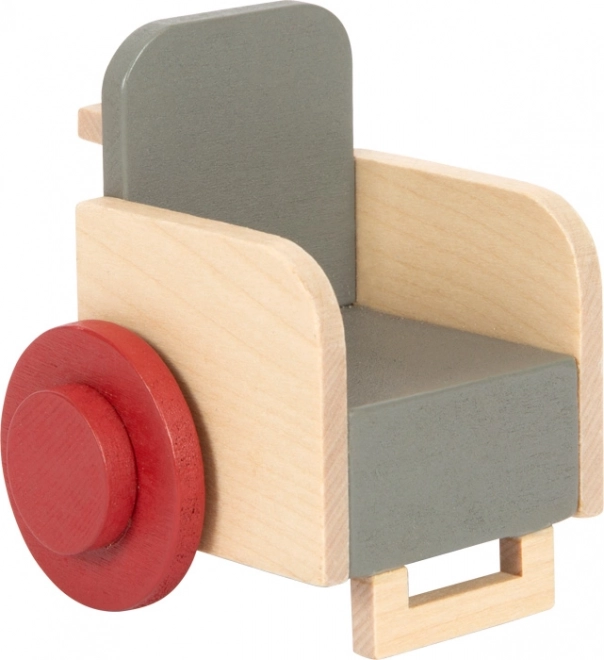 Petites figurines en bois famille avec fauteuil roulant