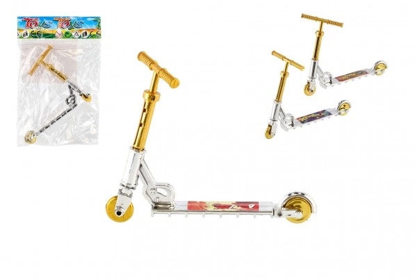 Trottinette à doigt en plastique 10 cm assortiment en sachet