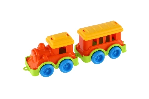 Petit train en plastique avec wagon