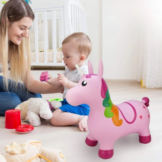 Licorne sauteur Woopie rose avec pompe