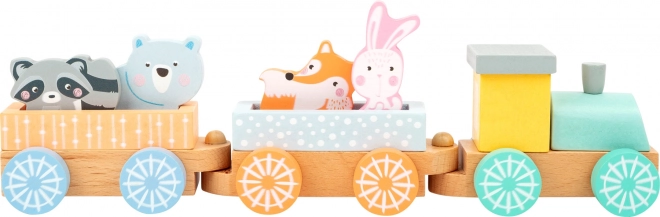 Petit train en bois aux couleurs pastel