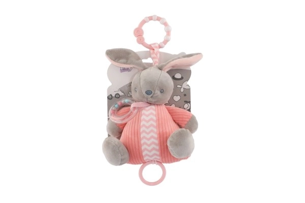 Lièvre musical à remonter avec hochet en peluche 18x20cm rose sur carte en sachet 0+