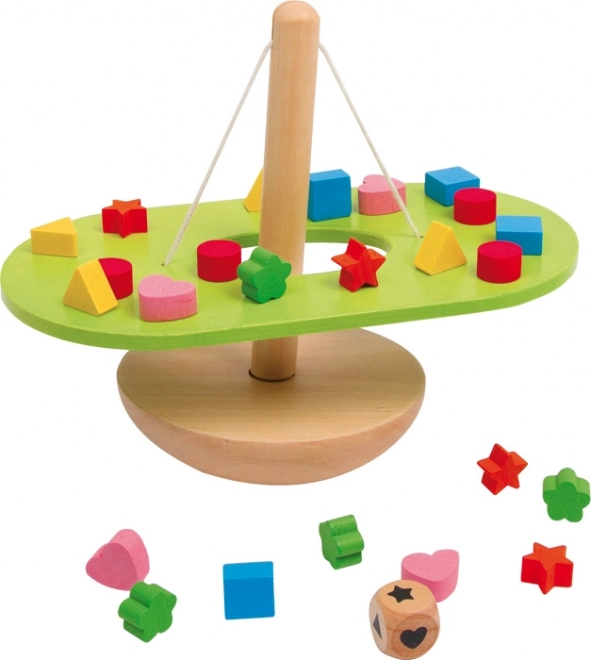 Houpa balançoire en bois pour l'équilibre moteur de Small Foot