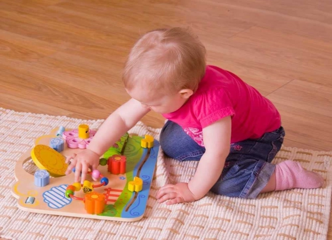 Bigjigs Baby Planche moteur en bois fleurs