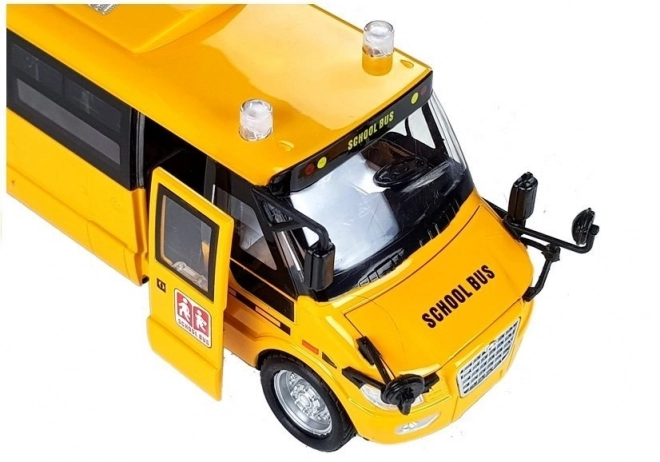 Autobus scolaire en métal avec moteur à remontoir