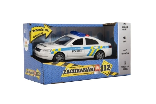 Voiture de police en plastique 15cm à piles avec son et lumière sur inertie en boîte 20x11x9cm