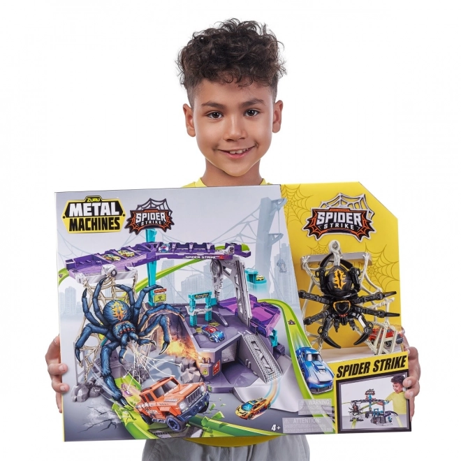 Circuit de voitures attaqué par l'araignée